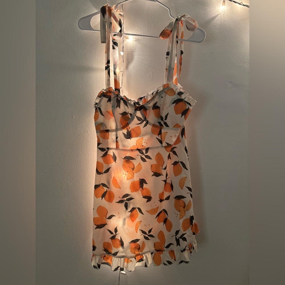 Celine White dress with orange and green leaves